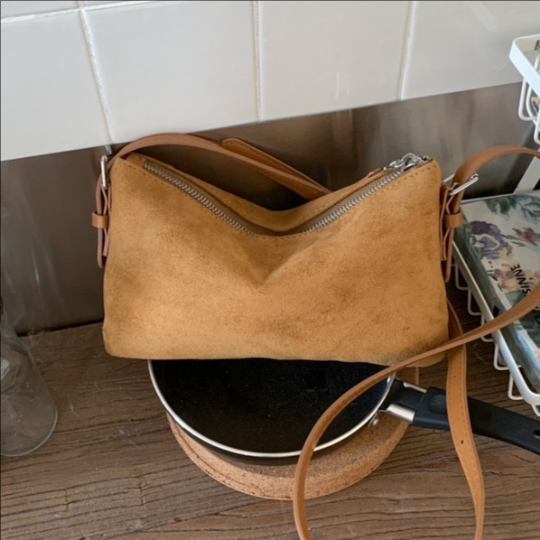 Transfronterizo 2025 invierno leopardo nuevo retro bolso de brazaleta de moda de mujer bolso de hombro de estilo extranjero bolso de transporte universal