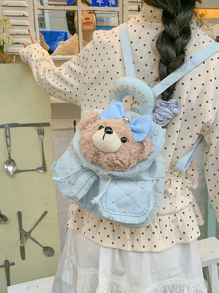 Korean-style fresh and colorful bear plush backpack with multiple pockets and a drawstring design, a casual and versatile backpack for girls