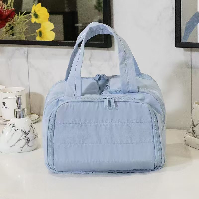 Xiaohongshu 同じスタイルの女性用化粧品バッグ、大容量のスキンケア製品収納バッグ、化粧ブラシパーティション、旅行用トイレタリーバッグ|undefined