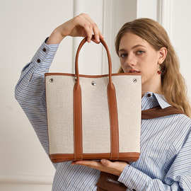 竖版花园包帆布拼接真皮单肩上班族女高级感大容量笔记本手提包