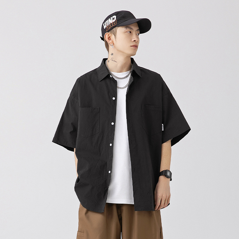 Camisa de manga corta con bolsillo de color sólido estilo retro coreano y japonés para hombre, camisa de trabajo de marca holgada y moderna para primavera y verano para hombre q
