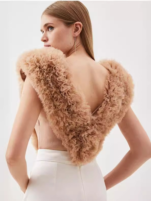 Europa y América Primavera/Verano Maillard Tops ajustados de alta gama Diseño femenino Cuello en v Tops de malla hinchada Estilo de temperamento de mujer image 3