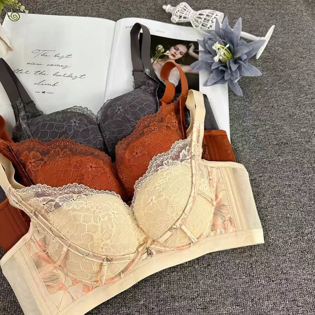Nuevo sujetador de alta calidad de moda de encaje jacquard transpirable y cómodo ajustable anti-caída reunido tres filas de ropa interior de botón