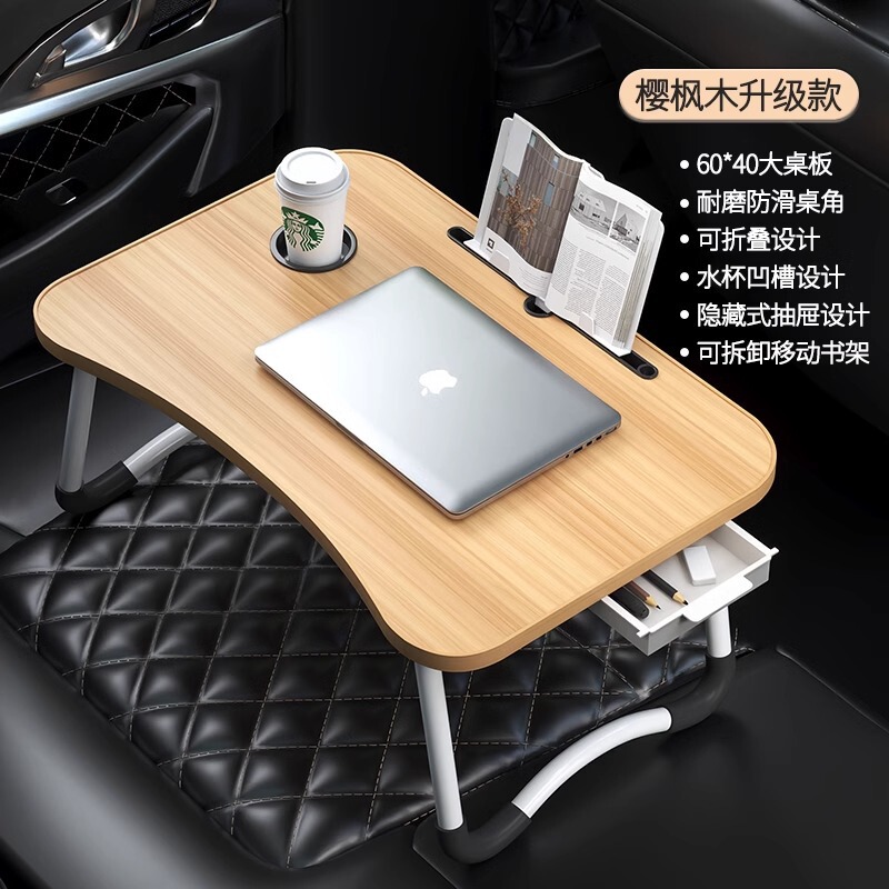 車の上の小さい机の板は食事ができます。|undefined