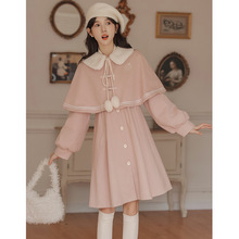 少女甜美粉色气质减龄斗篷假两件娃娃领毛呢收腰连衣裙女中长款