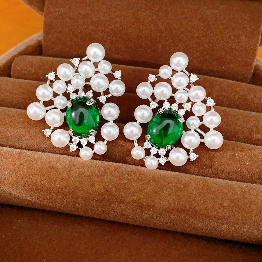 Agujas de plata de piedra de perla oval pendientes de perla estilo palacio delicado pendientes de nicho ligero lujo alta sensación auriculares al por mayor