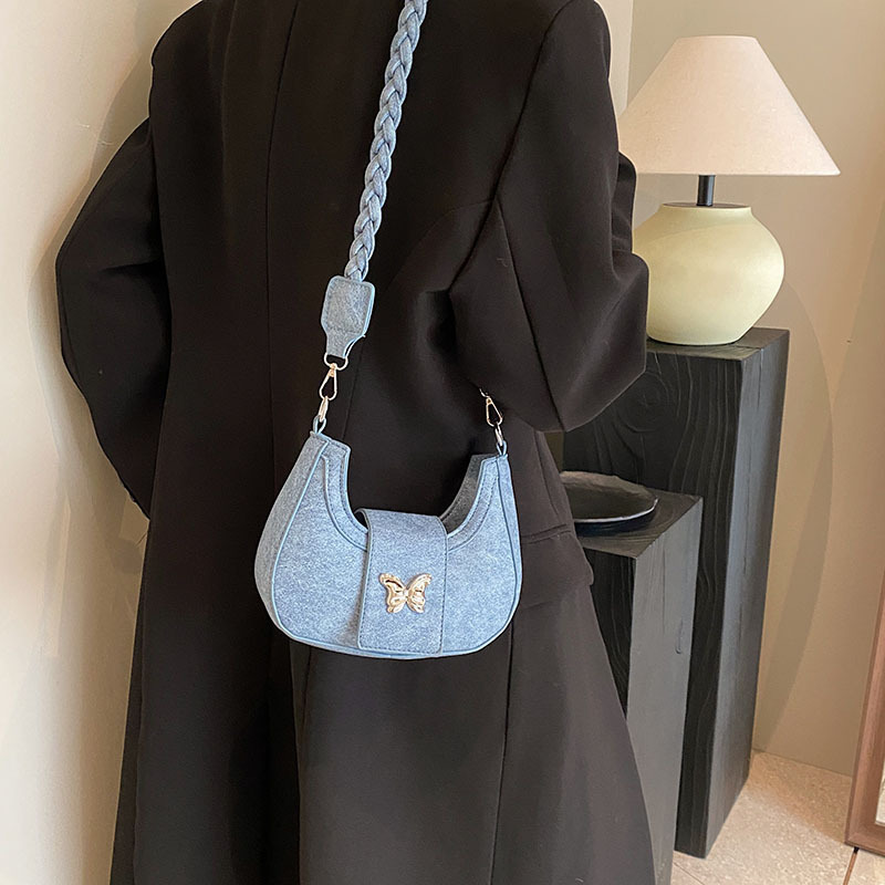 Bolsos de nicho populares para mujer 2024 invierno nueva cadena de moda simple bolso de hombro casual coreano bolso de luna nueva para mujer