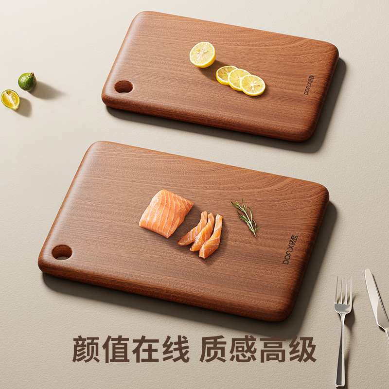 Square with round holes household wenge wood cutting board fruit board Japanese-style solid wood antibacterial pizza board kitchen chopping board Square with round holes household wenge wood cutting board fruit board Japanese-style solid wood antibacterial pizza board kitchen chopping board