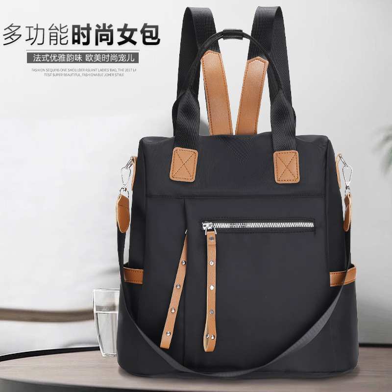 2023 nueva mochila de tela Oxford para mujer casual moda contraste color viaje antirrobo mochila portátil mochila escolar al por mayor