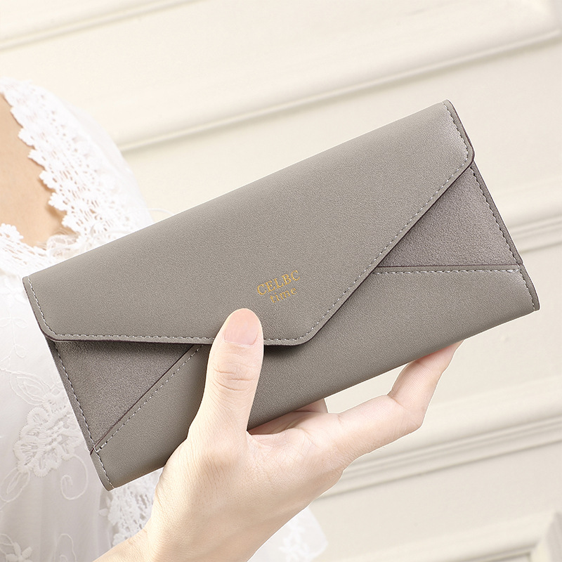 Nueva cartera de las mujeres largo 2023 verano monedero de las mujeres de alta calidad color sólido cremallera embrague al por mayor