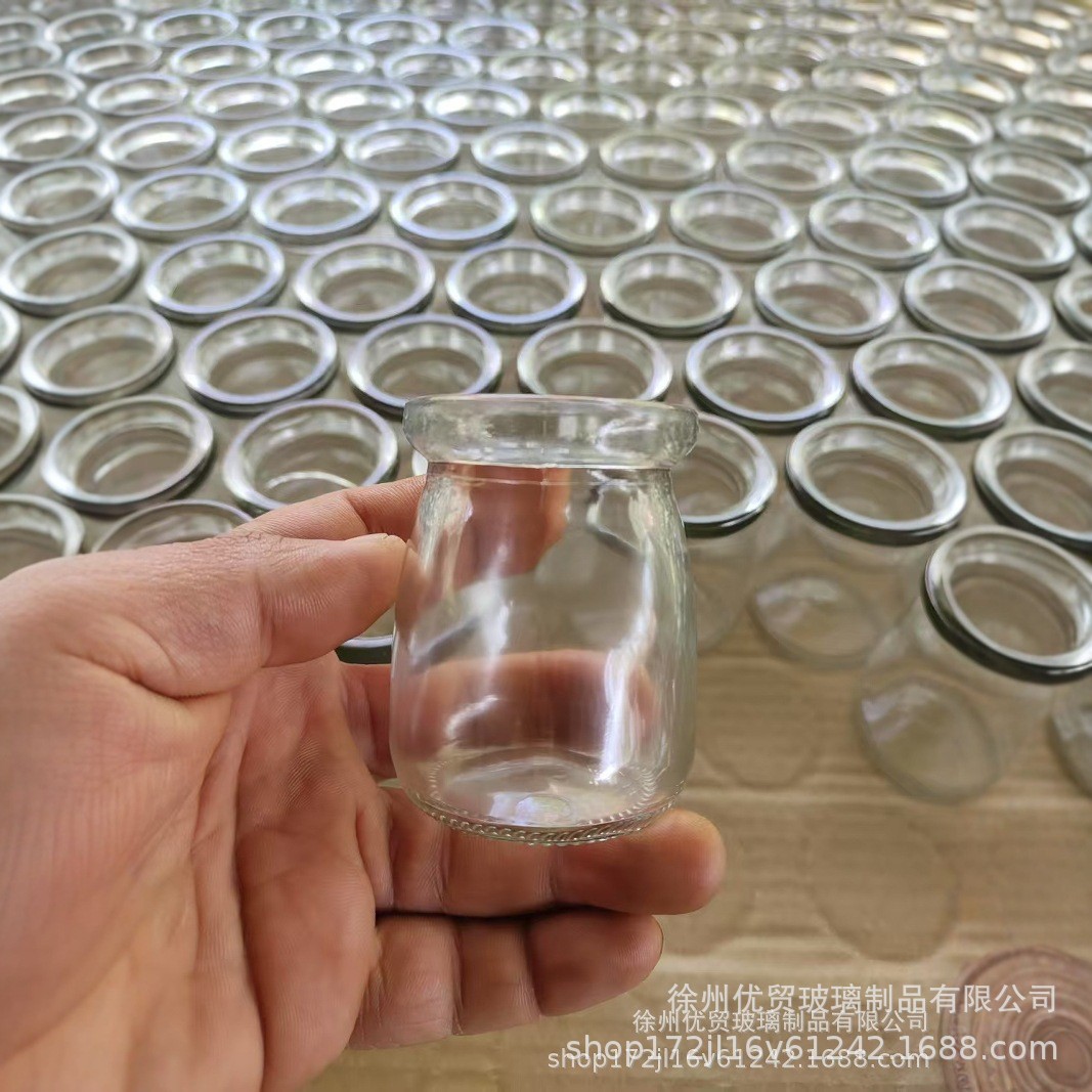 Venta al por mayor botella de pudín de vidrio de 100ml taza de leche gruesa botella de yogur resistente a altas temperaturas botella de vidrio de corcho