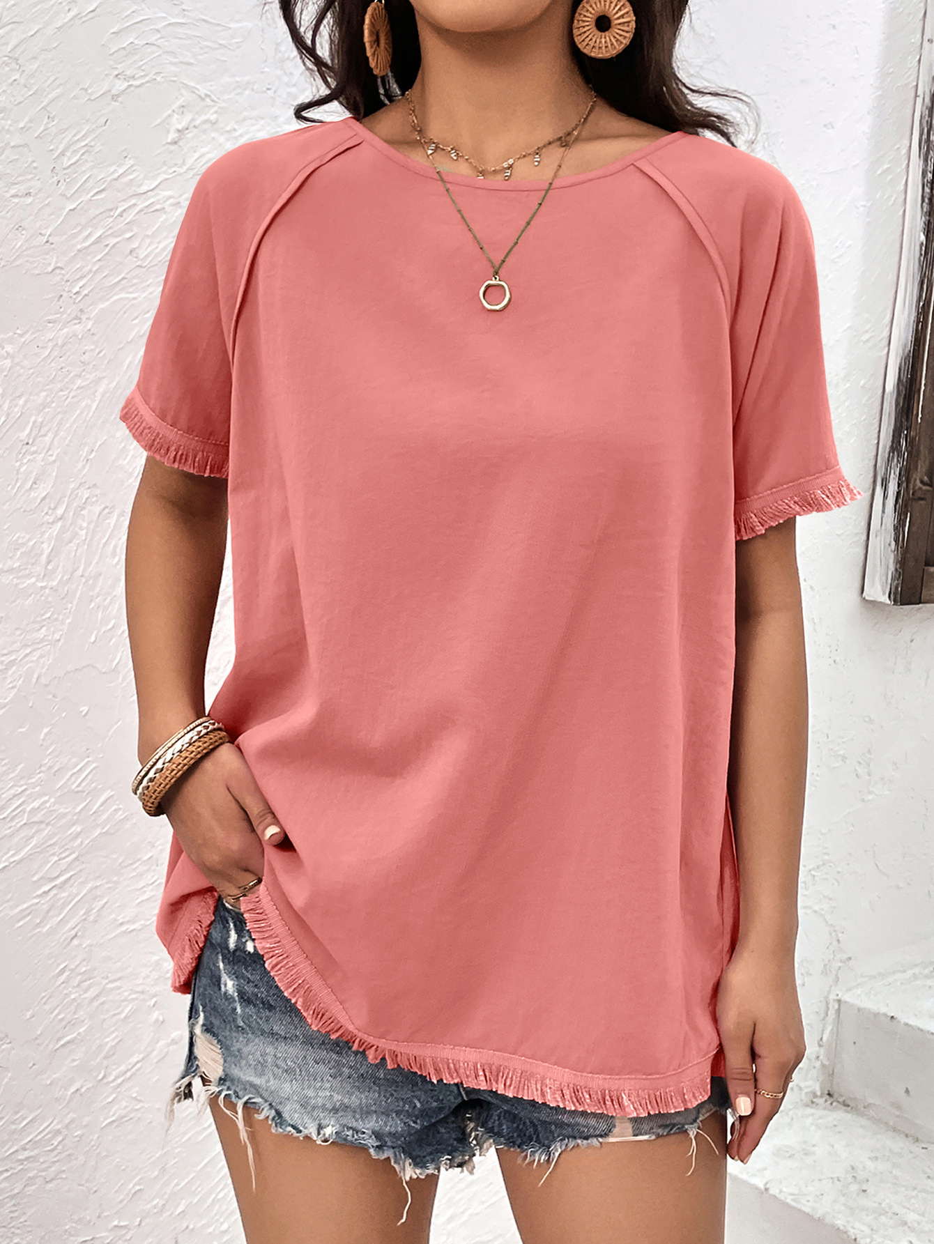 Top casual ampio con scollo tondo e frange da donna_voghion.com