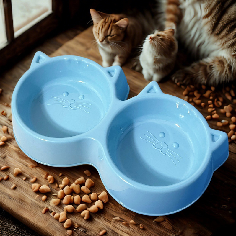猫碗の食べ飲み用の丸い猫の顔の形の双碗の猫の食糧碗は洗浄しやすくて頚椎のペットの碗を保護します。|undefined