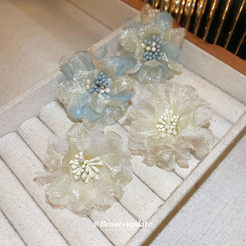 Pendientes de estambre de malla de flor de aguja de plata Pendientes coreanos pequeños frescos de alta gama Pendientes dulces de súper hadas de verano al por mayor