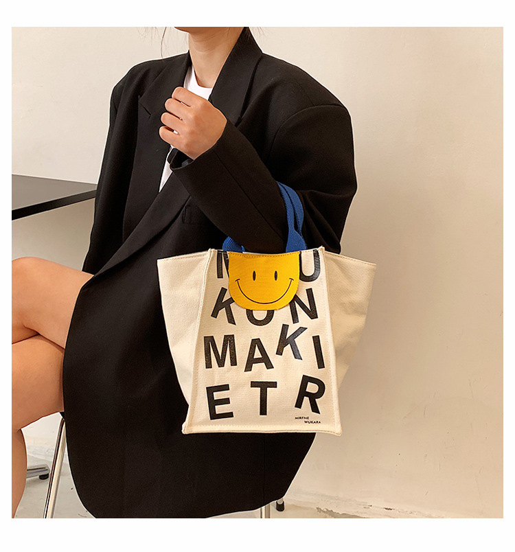 Tide Brand Letter Printed Canvas Korean Shoulder 2021 Fashion New Smiling Face Handbag display picture 3