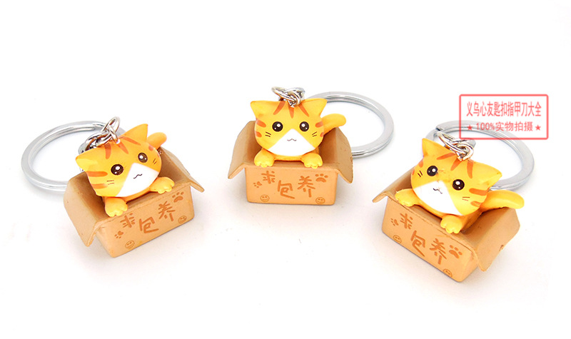 Gato de dibujos animados llavero colgante lindo gato muñeca estudiante adornos campus tienda suministro al por mayor