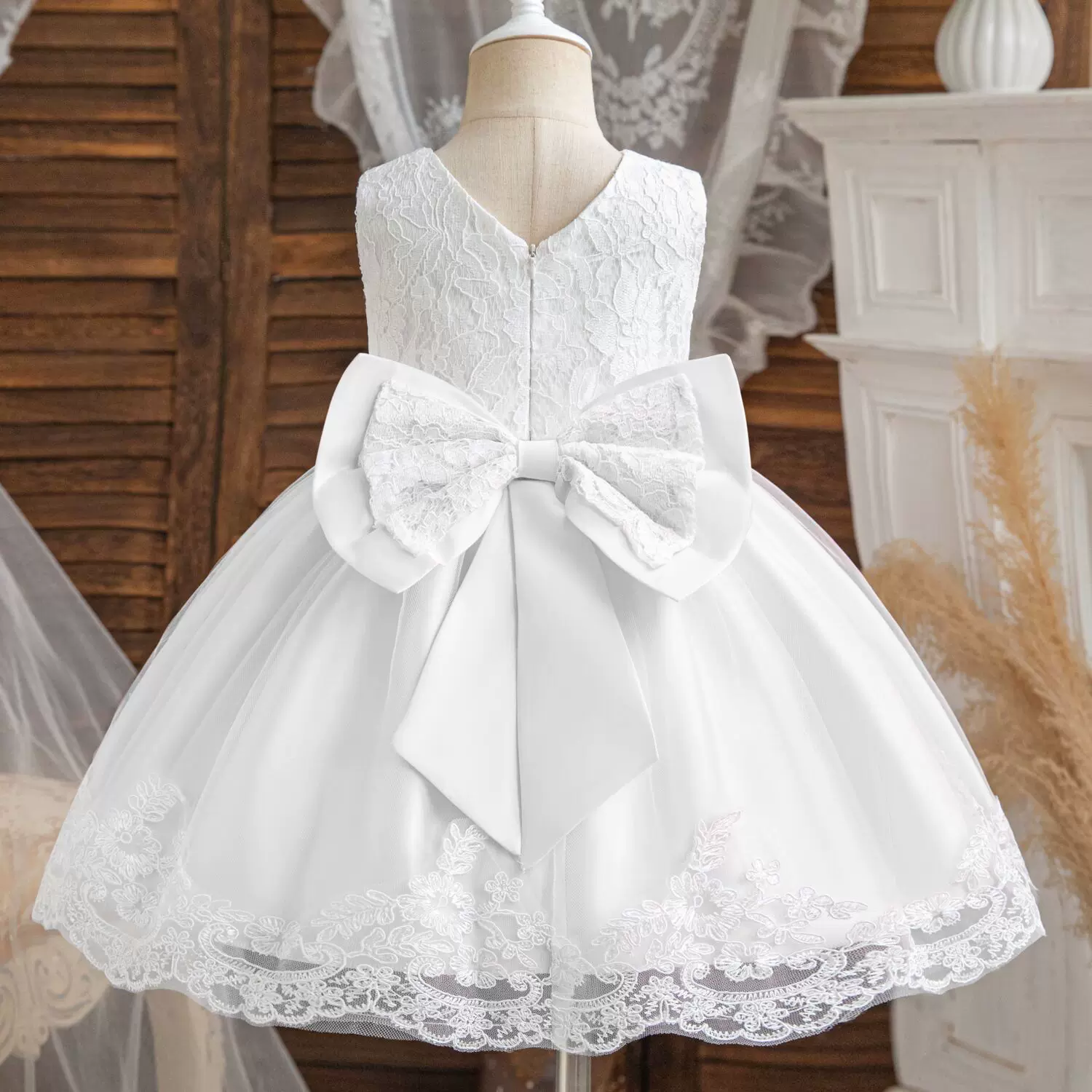 婴童周岁礼服2025跨境新款满月礼服女网纱印花送蝴蝶结婴儿礼服裙