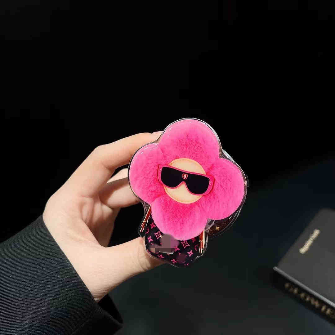 新型高級マグネットスタンドマグネット式携帯ケース通用太陽花マグネット式エアバッグスタンドはおしゃれで豪華です。