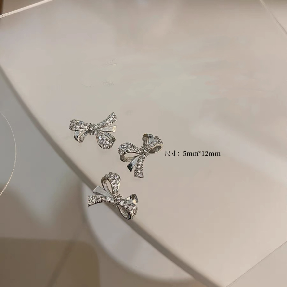 Celebridad de Internet nuevos accesorios de uñas Iris arco de alta retención de color ajuste arco de uñas diamante desgaste material de uñas diamante