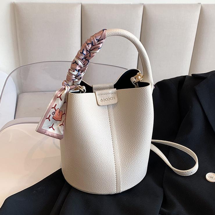 Bolso de mano universal bolso de mujer 2025 nuevo estilo estilo estilo extranjero sensación de bolso de cubo de verano sensación de alto nivel de hombro mochila