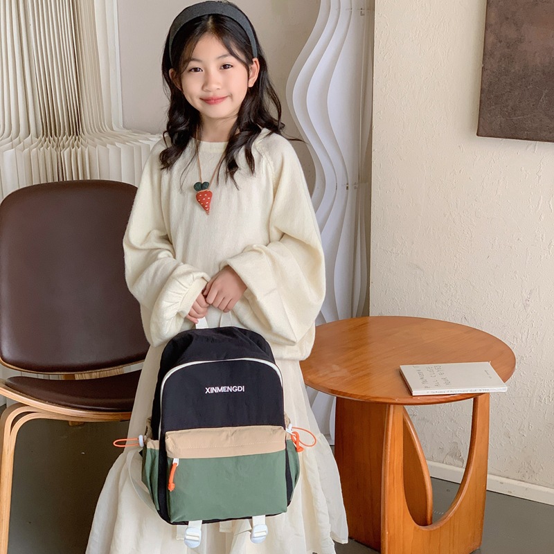 Mochila de moda simple para niños y niñas, mochila de estudiantes de escuela primaria de gran capacidad 2026 nueva mochila de color extranjero para niños