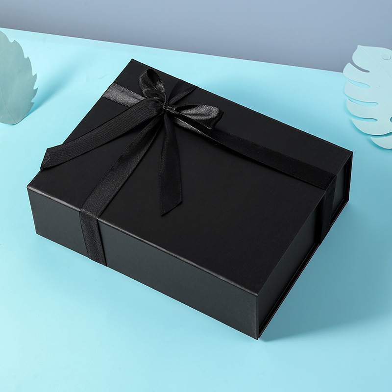 Caja de regalo plegable con lazo de una pieza para el Día de San Valentín, caja de regalo simple para cumpleaños, caja de embalaje para regalo, producto de venta caliente transfronterizo.