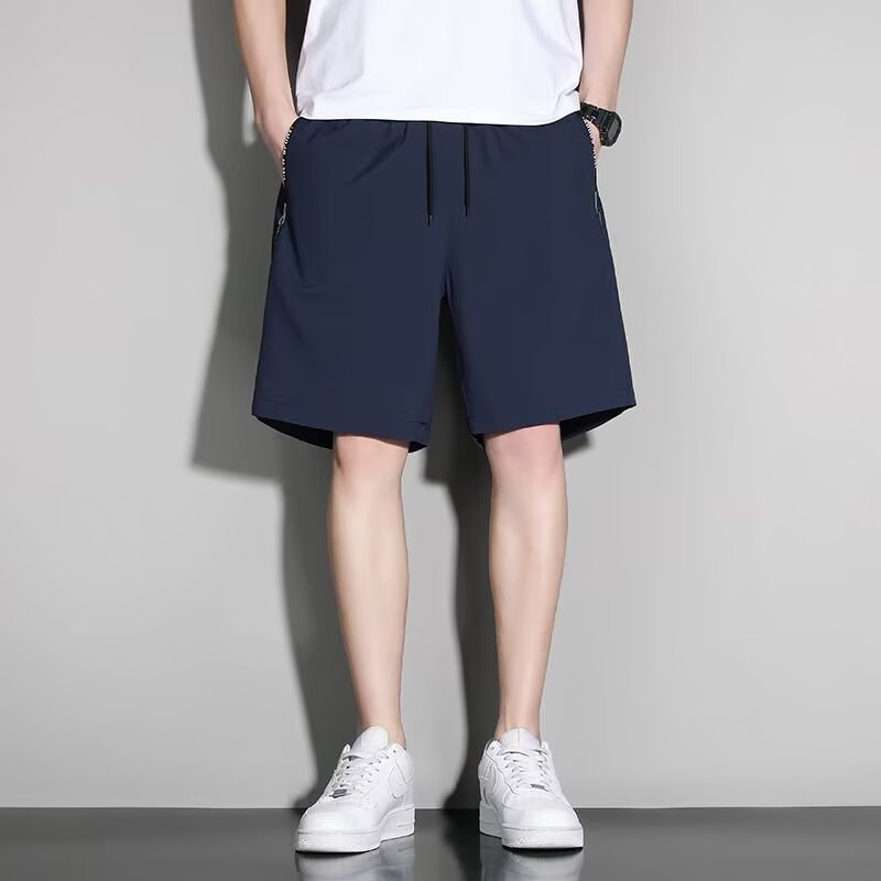 Verano nuevo estilo pantalones cortos estadounidenses marca de moda masculina estilo delgado sentido de diseño nicho holgado talla grande deportes ocio pantalones de cinco puntos