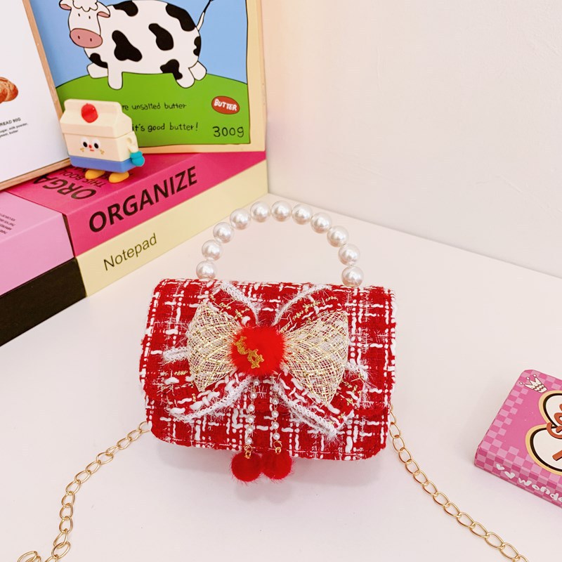 Nuevo bolso de Año Nuevo rojo de niñas lindos bolsos de princesa de arco bolsos de mano bolsos de cambio de niñas bolsos de mochila