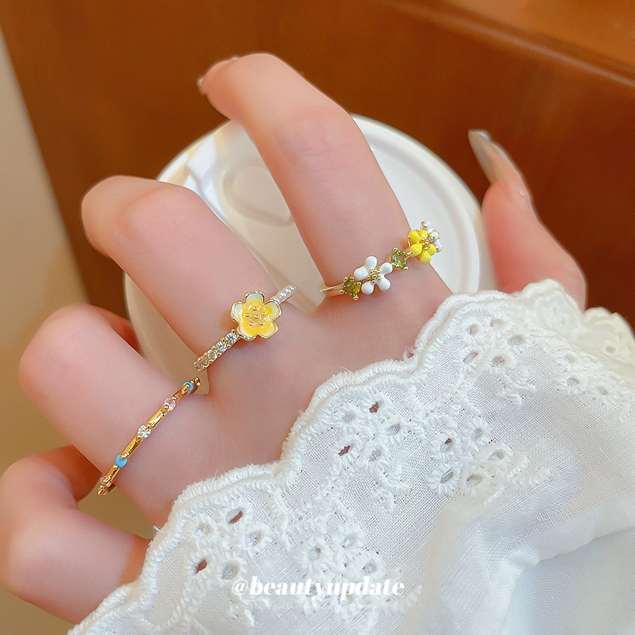 Bague pour femme, plaquée or véritable, ornée d'une goutte d'huile et d'un zircon en forme de fleur, style palais ouvert, pour l'index. Un bijou léger, luxueux et raffiné._voghion.com