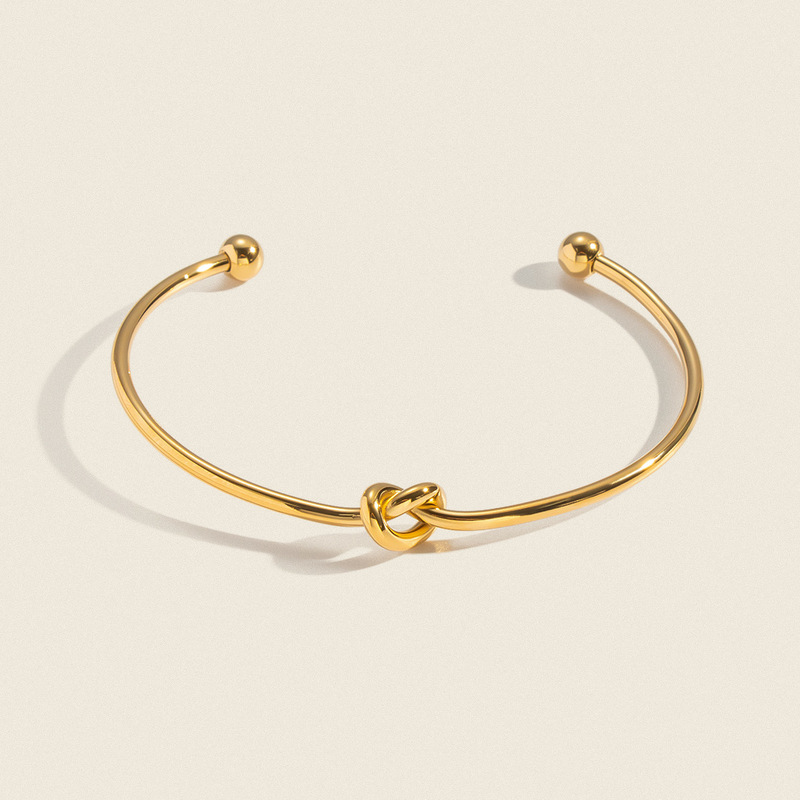 Minimalist Knotted Heart-Shaped Open Bracelet, Stainless Steel Vacuum-Plated 18K Gold, Versatile and High-End Jewelry Minimalist Knotted Heart-Shaped Open Bracelet, Stainless Steel Vacuum-Plated 18K Gold, Versatile and High-End Jewelry