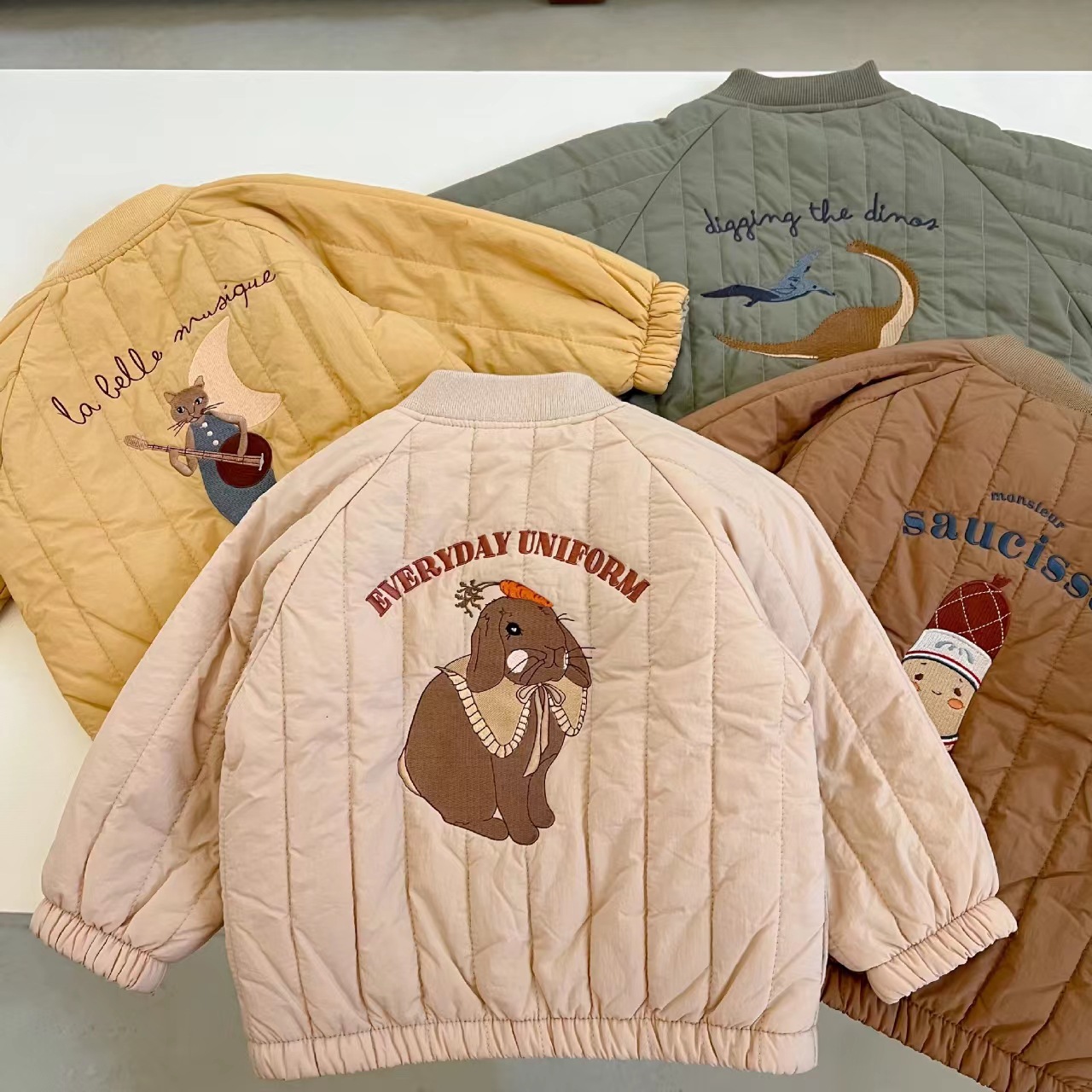 Children's cotton-padded jackets, boys' and girls' autumn and winter styles, cartoon baseball jackets, quilted baby coats, warm, in stock.