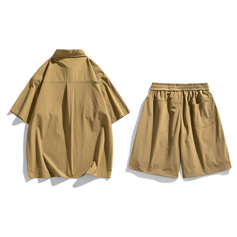 Trajes deportivos de moda masculinos de moda dos pantalones cortos de mangas cortas de verano sueltos y frescos al por mayor