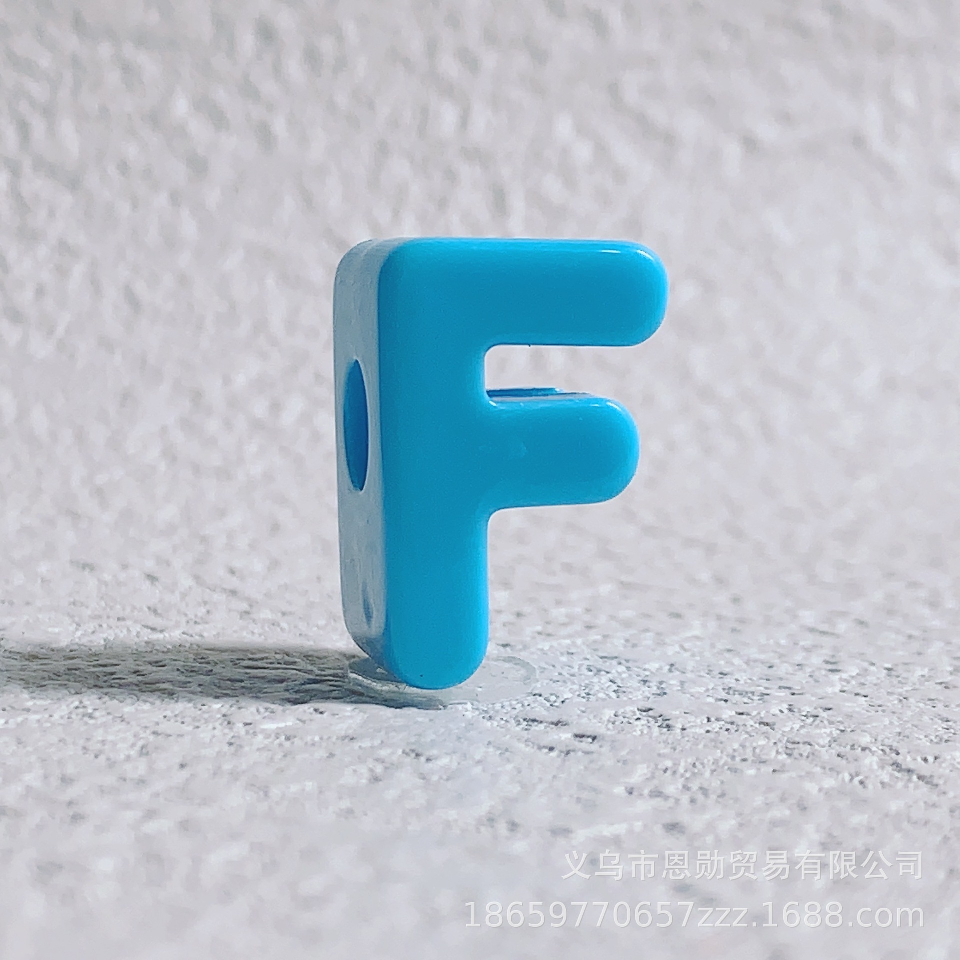 F (Blue)