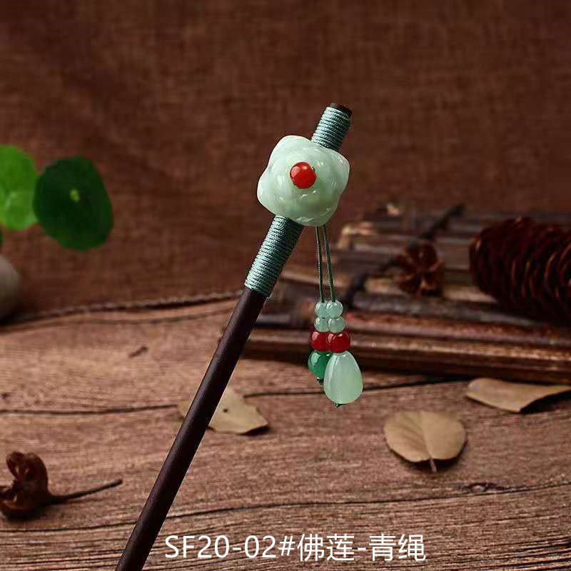 黒檀の木のかんざしのフリンジをまねて、かんざしの子供の古風な頭飾りをします。|undefined