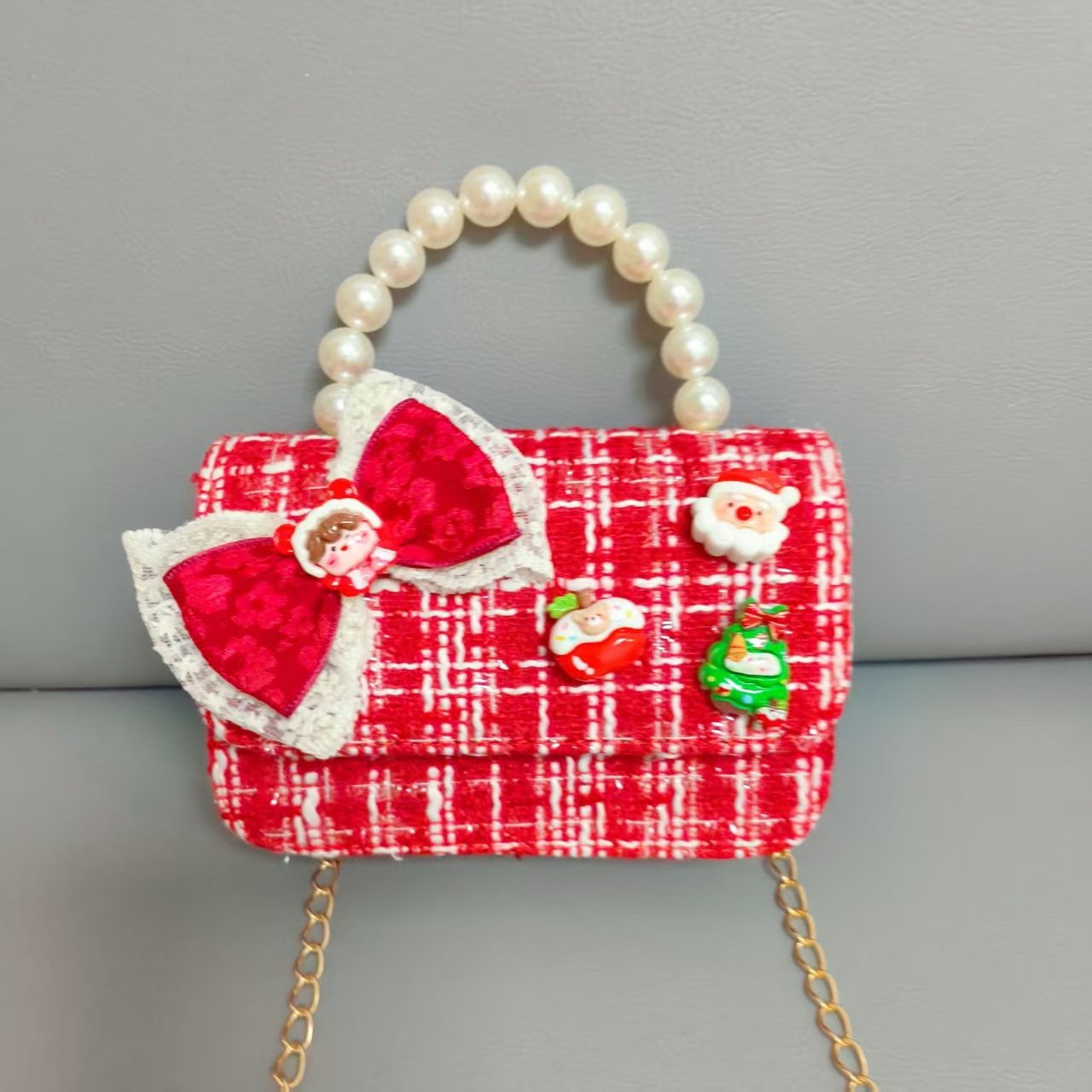 Cartera de Año Nuevo rojo arco de papá Noel bolso de perla pequeña cadena de viento fragante bolso de hombro