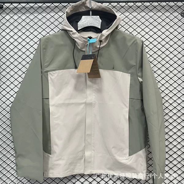 New hooded windbreaker, waterproof, windproof, warm, and stylish outdoor jacket for couples, men and women, a lightweight and luxurious windbreaker