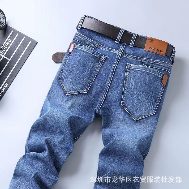 Yumao jeans elásticos para hombres pantalones casuales de negocios de talla grande sueltos rectos pantalones para hombres al por mayor para jóvenes