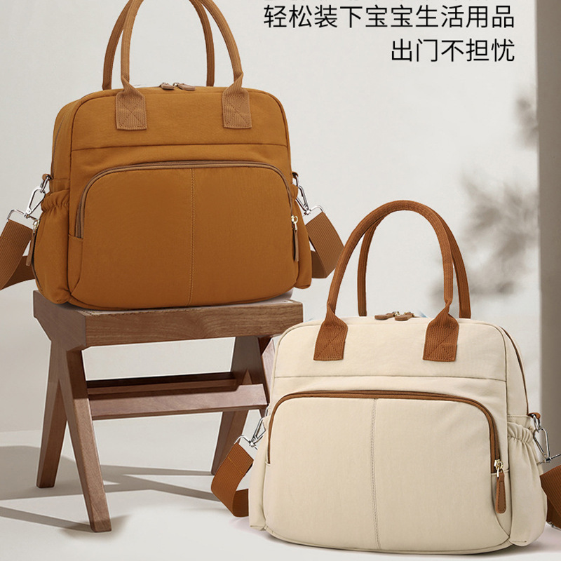 Casual and Fashionable Mommy Bag 2025 New Large-Capacity Dry and Wet Separation Portable Baby Supplies Storage Mother and Baby Bag