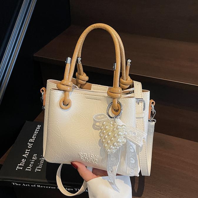 Bolso de mano de tendencia de comercio exterior femenino 2025 nuevo estilo plisado todo-fósforo bolso de hombro retro de alta gama ocio cubo bolso