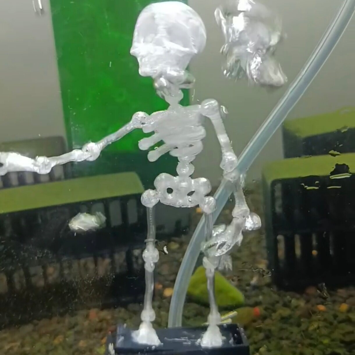 Dancing skeleton aquarium bubbler in motion