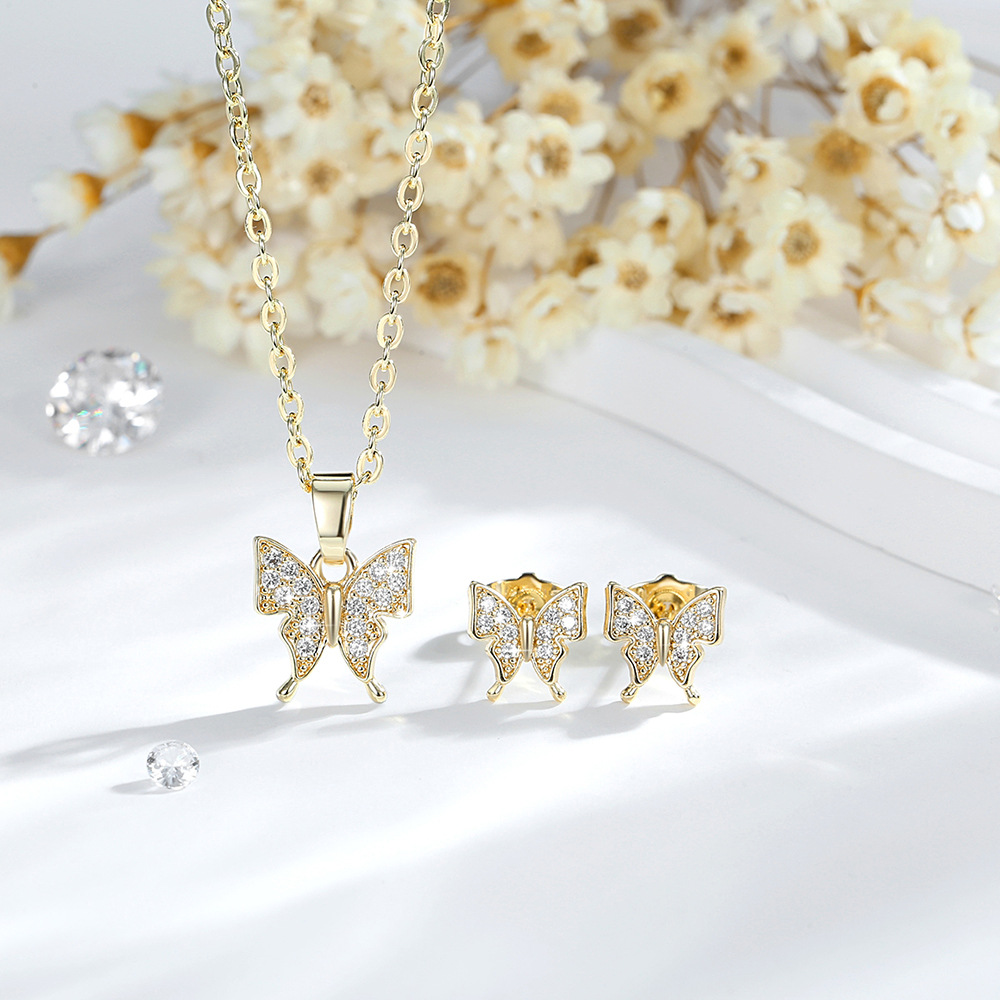 Transfronterizos diamantes mariposa pendientes collar conjunto de moda o cadena temperamento mariposa colgante joyas chapadas en oro de cobre