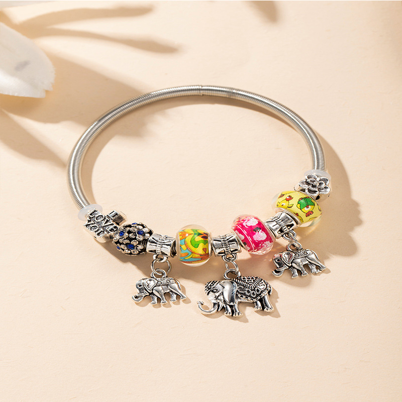Panjia pulsera Dora DIY cuentas explosivas transfronterizas colgante de elefante letras de cristal cuentas pétalos pulsera ajustable