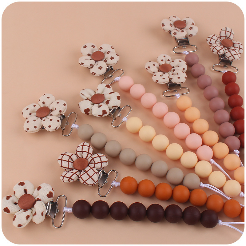 Nuevo bebé suministros de dibujos animados flor chupete clip calmante bebé creativo silicona mordedura pezón anti-gota cadena