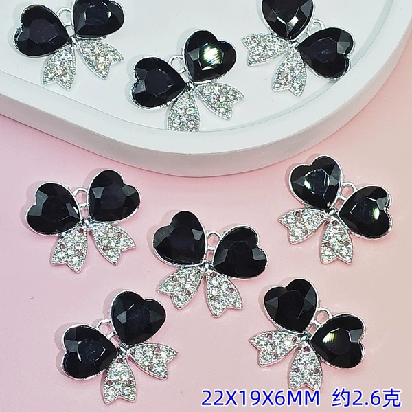 Black pendant with bow