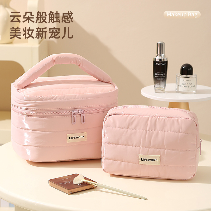 Nueva bolsa de almacenamiento portátil impermeable bolsa de maquillaje de mano bolsa de viaje bolsa de plumaje bolsa de maquillaje de alta capacidad