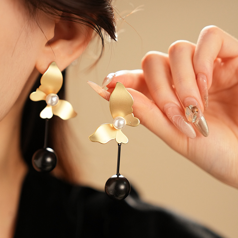 Pendientes de borla de flores de tul de aguja de plata Pendientes de súper hada verde menta fresca Pendientes de diseño exagerado de nicho