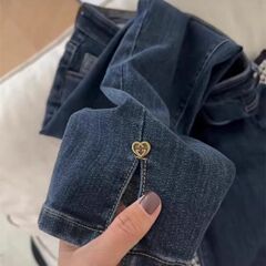 レトロな腰の高い弾力のジーパンの女性の2025年の春秋の新型の小さい子はやせているストレートな筒の9分のタバコの管のズボンを現します。