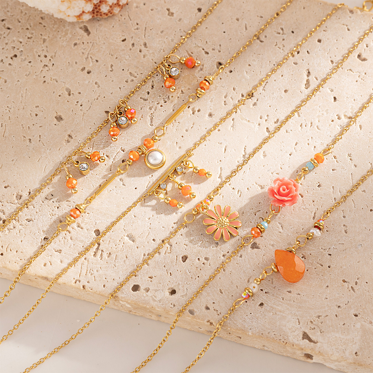 Tena Europa y América naranja con cuentas pulsera de cadena de acero inoxidable apilada y chapada en oro de 18 quilates simple joyería de mano ins para mujer