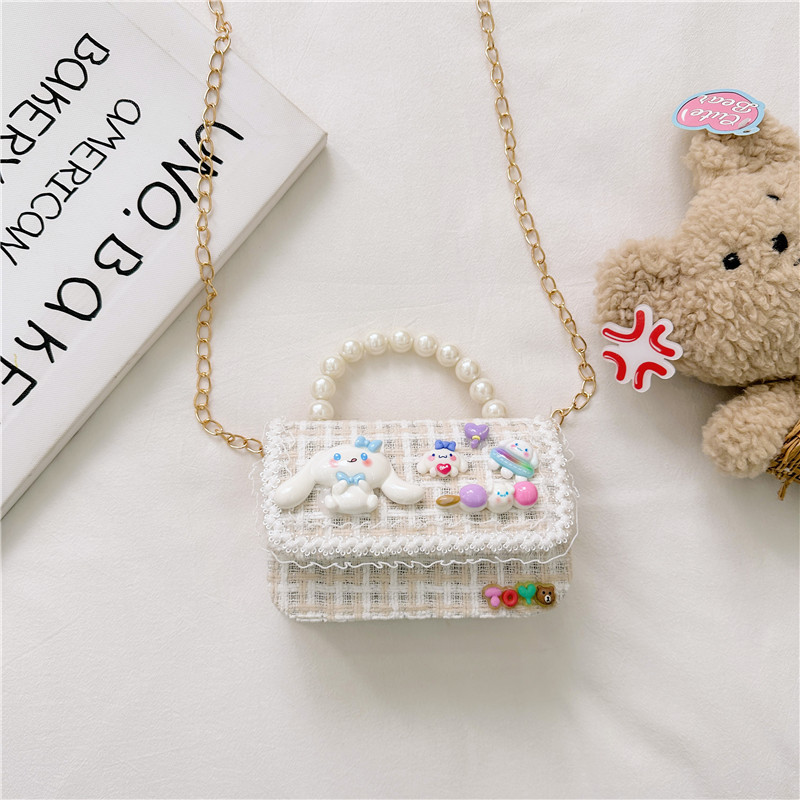 Otoño e Invierno nueva niña monedero dibujos animados lindo accesorios perla bolso versátil estilo occidental bebé bolsa de hombro