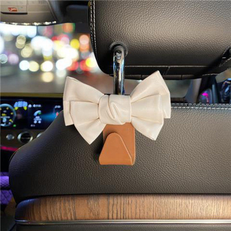 Garganto de automóvil Garganto de respaldo de silla Red cuero lindo arco multifuncional coche pequeño gancho de plástico